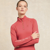 Lady wears the Holland Cooper Chiltern Base Layer in Washed Red